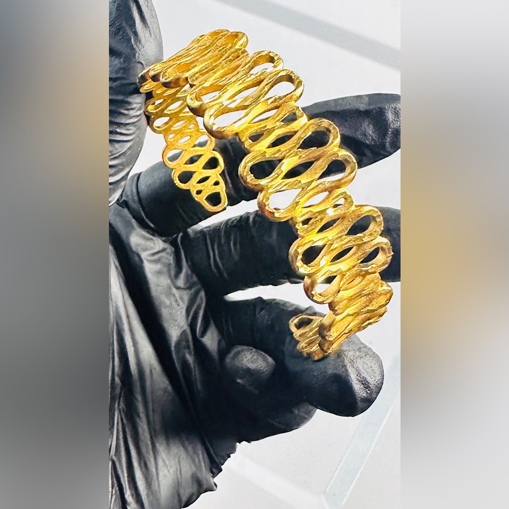 18 karat Gold plated Spiral Adjustable Bangle.